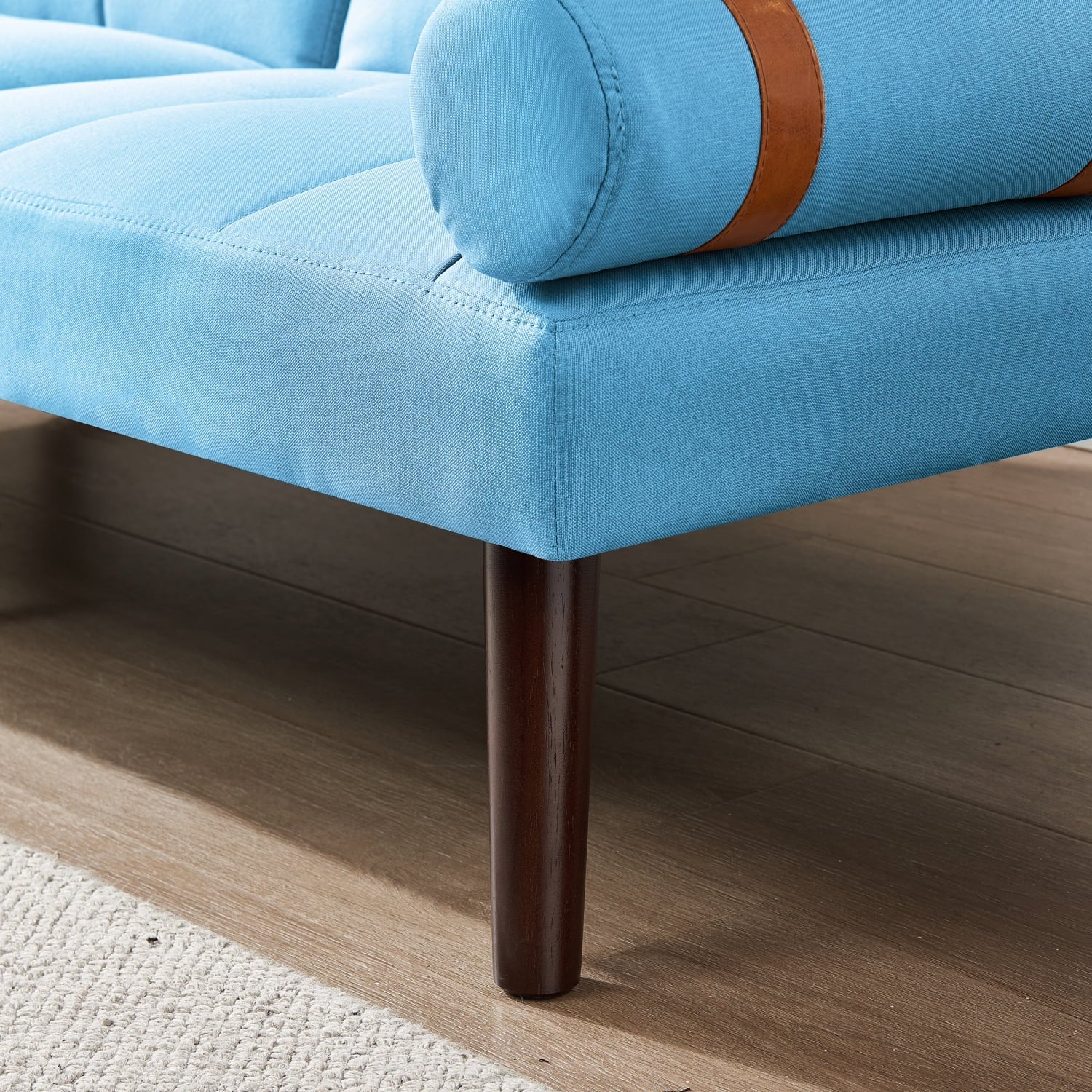 Blue Linen Modern Convertible Futon Sofa Bed with Solid Wood Legs for Versatile Sleeping Options and Stylish Living Room Decor.